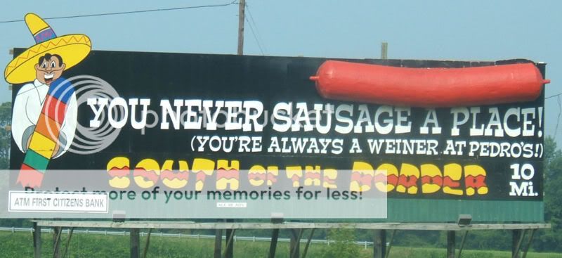 800px-south_of_the_border_sign_10_-_you_never_sausage_a_place.jpg