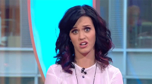 katy-Perry-blowing-raspberry-tongues-reaction-13606785811.gif