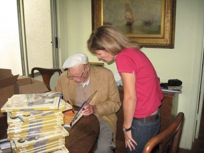 Wally signing my book.jpg