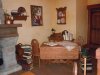 MK inside Belle's cottage 1.jpg