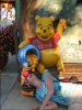 Christin getting some honey.JPG