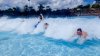Hit - Alicia gets it in the back and Rachel is overwhelmed (Center) by the Wave.jpg