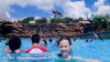 Rachel in the Surf Pool - With Miss Tilly and Mount Mayday in the background.jpg