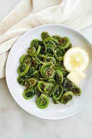 Sautéed Fiddleheads with Garlic Lemon Butter - It's a Veg World After All®
