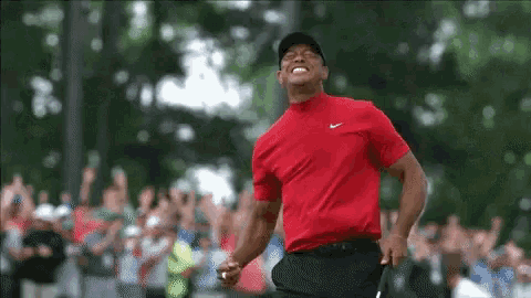 tiger-woods-celebrating.gif
