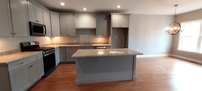 Condo kitchen and eating area.jpg