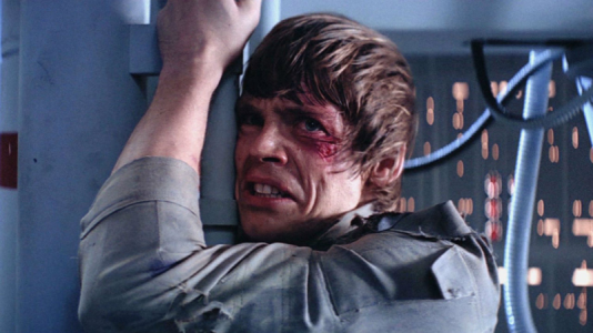 Luke Skywalker looking distressed after Darth Vader's revelation on Cloud City.