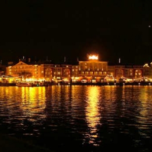 view of boardwalk all lite up from yacht club