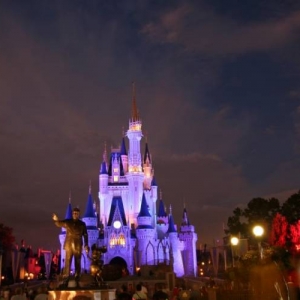 Partners Statue and Castle at Night