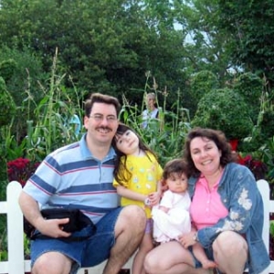 family with farmer Mickey