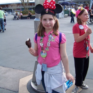 Emma eating a Mickey pop