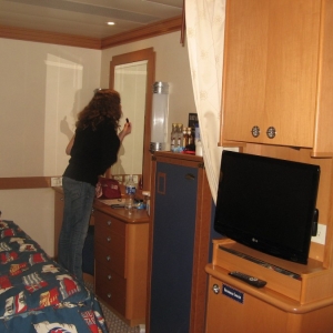Vanity area, flatscreen and storage