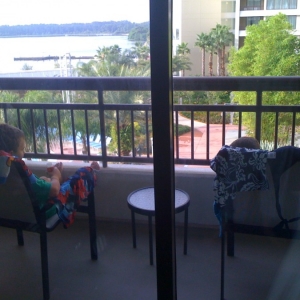 Kids relaxing on balcony