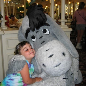 Caitlyn hugging Eyeore
