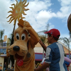 Pluto wearing Francesca's hat!