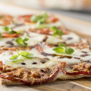 Oven-dried tomato flatbread with roasted beeksteak tomatoes