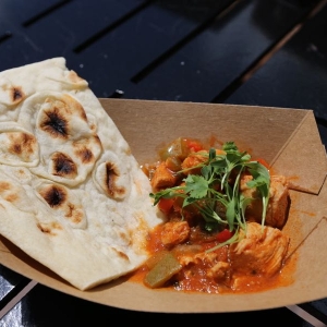 Buttered Chicken With Micro Cilantro And Naan Bread