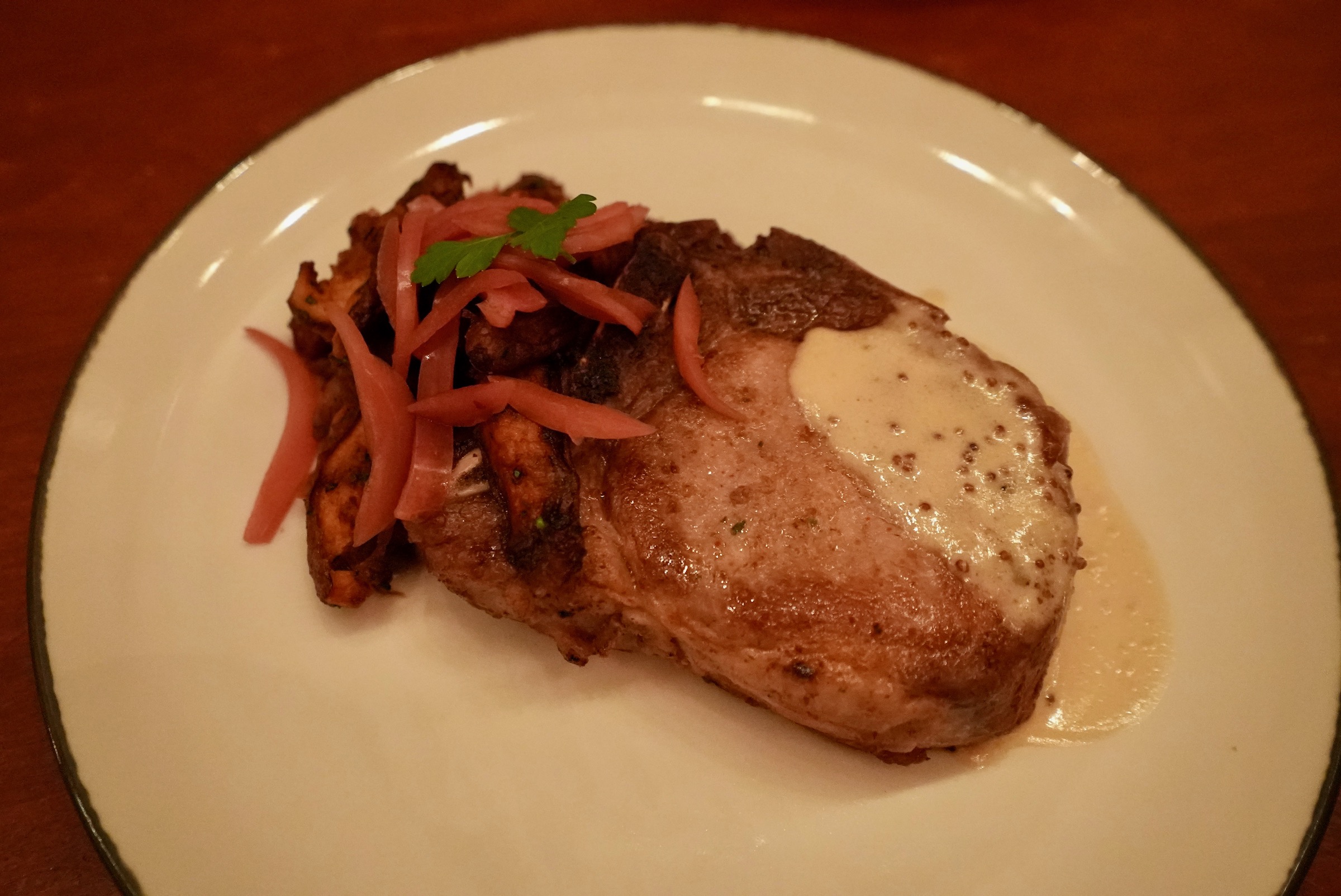 010_be-our-guest-magic-kingdom-pork-chop.jpeg