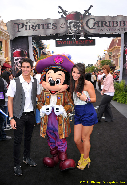 Actor Booboo Stewart, Mickey Mouse, and actress Fivel Stewart