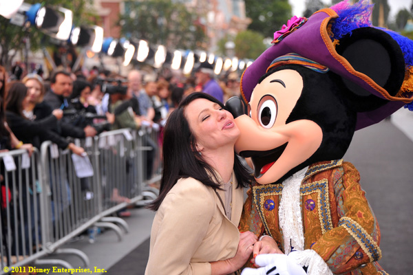 Actress Lynn Collins and Mickey Mouse
