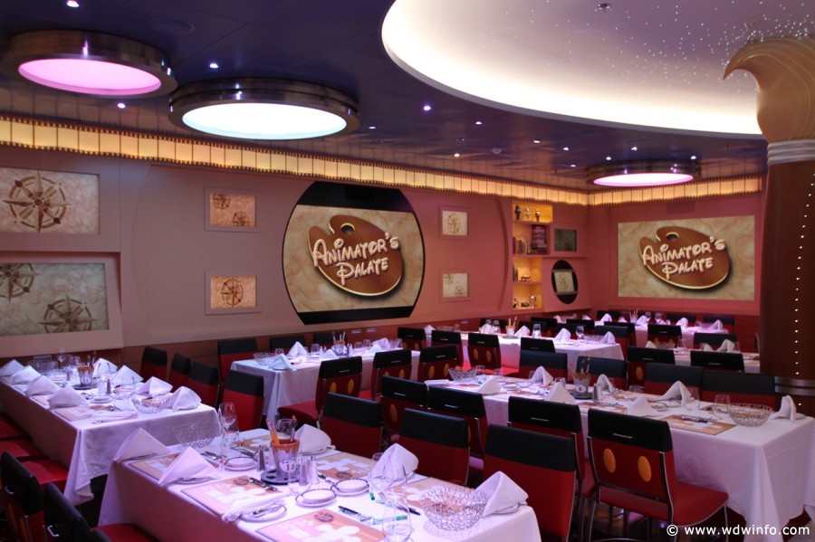 Disney Cruise Line Dining - Animator's Palate dining room. Most tables seat six to eight guests.