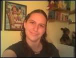 AT HOME WITH DISNEY POSTER IN BACKGROUND