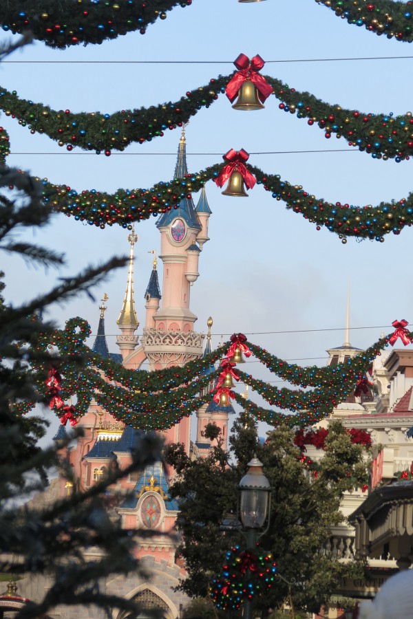 Castle through hanging decs over Main Street