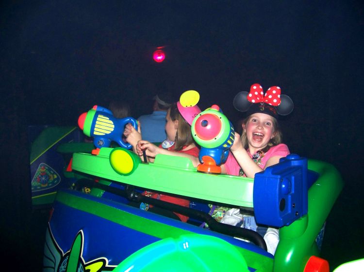 Emma on Buzz Lightyear ride