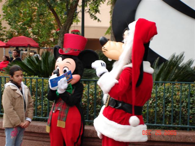 Mickey and Goofy dressed like Santa!