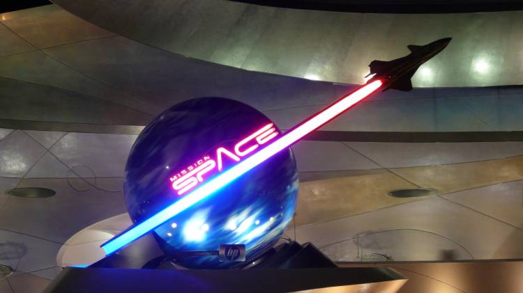 Mission Space sign at night