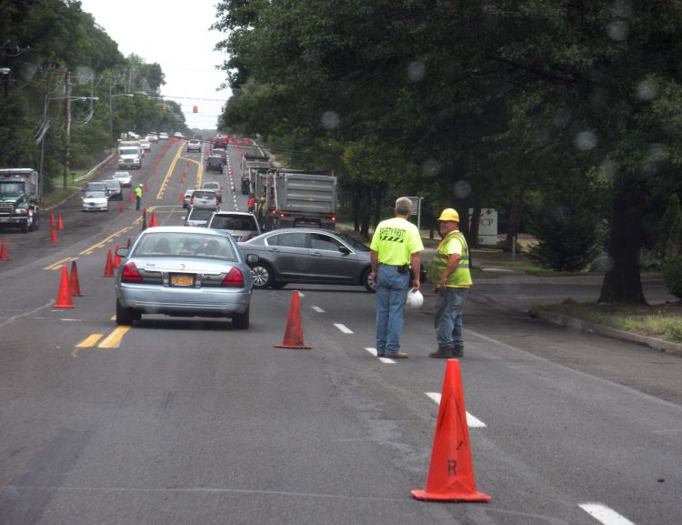 Orange_cone_with_construction_worker