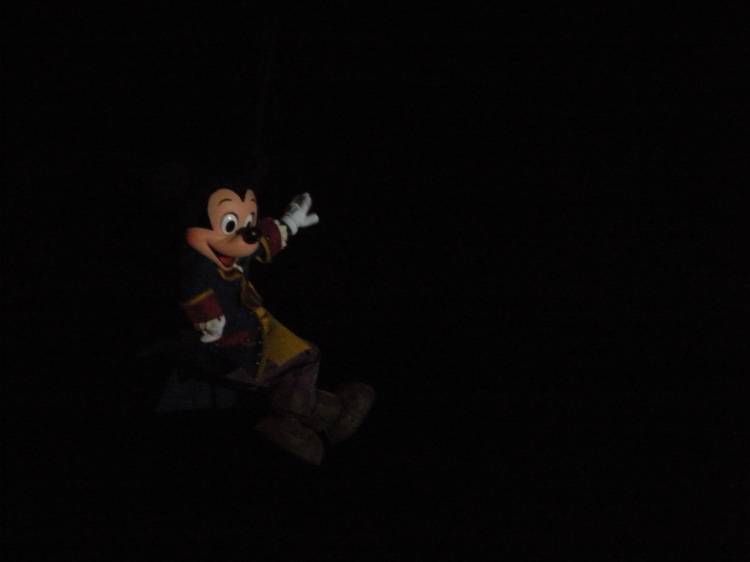 Pirate Mickey flies through the air