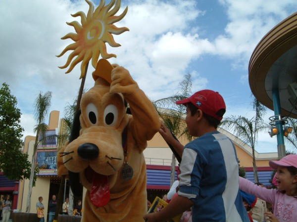 Pluto wearing Francesca's hat!