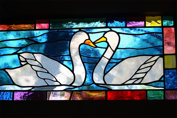 Stained glass swans