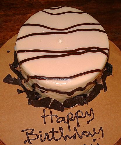 top view zebra-striped b-day cake