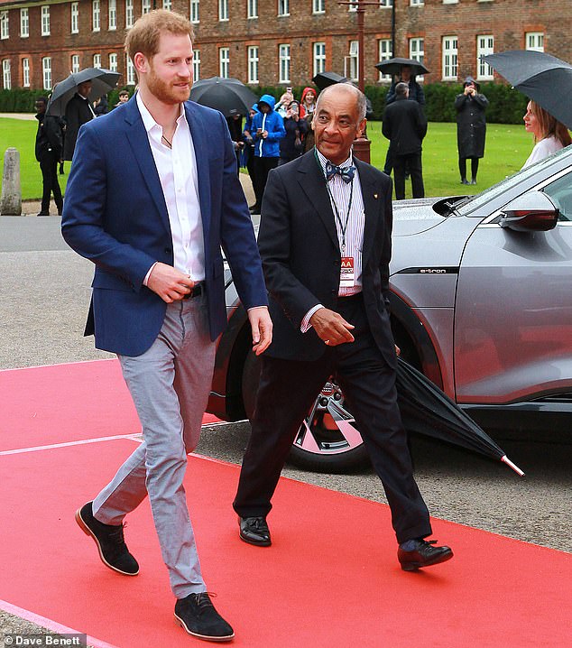 The Duke of Sussex and The Lord-Lieutenant of Greater London, Sir Kenneth Olisa, arrive at the Audi Sentebale Concert at Hampton Court Palace on June 11, 2019