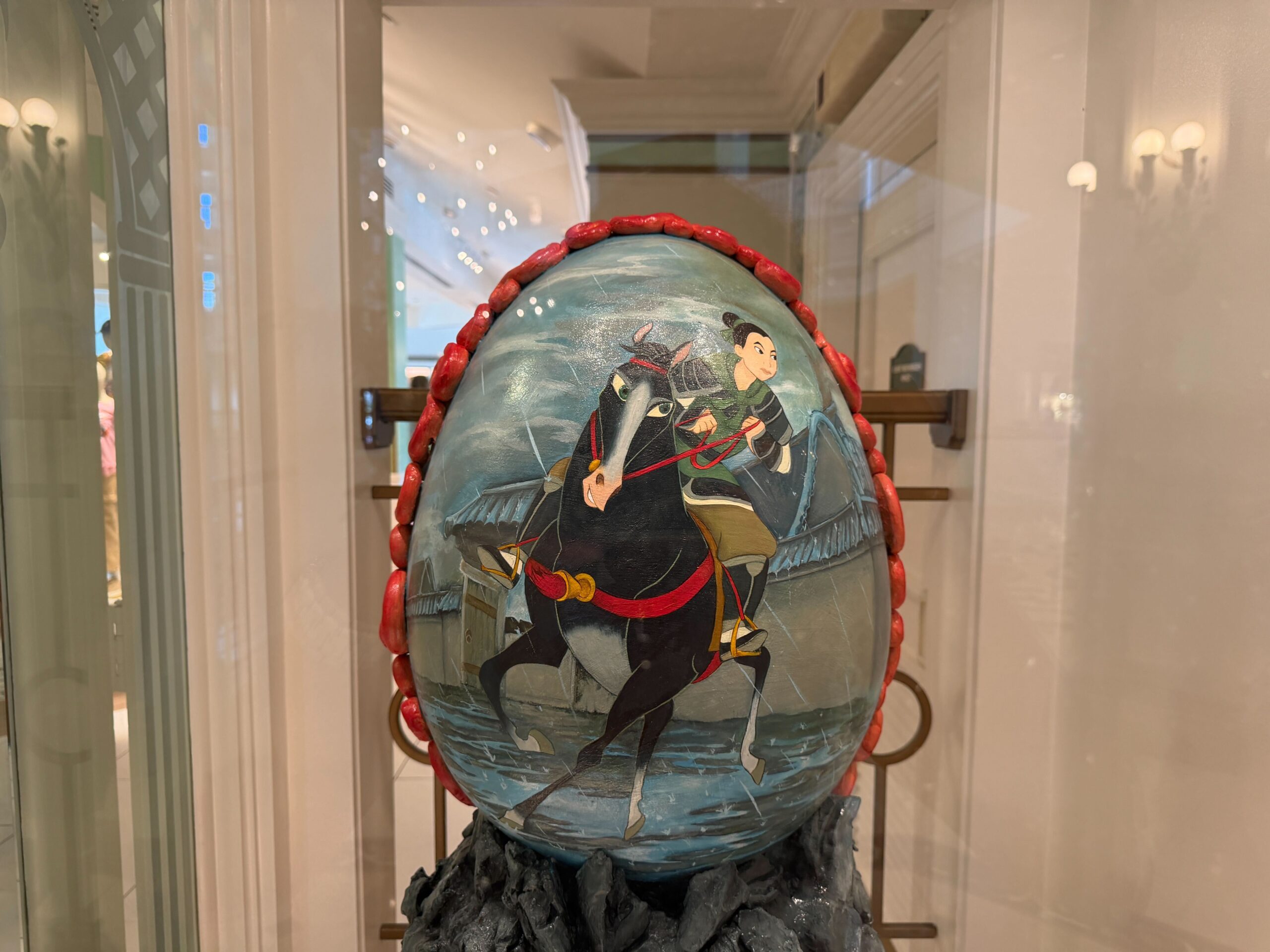 Chocolate Easter egg display themed to Mulan in the lobby of the Grand Floridian Resort at Walt Disney World