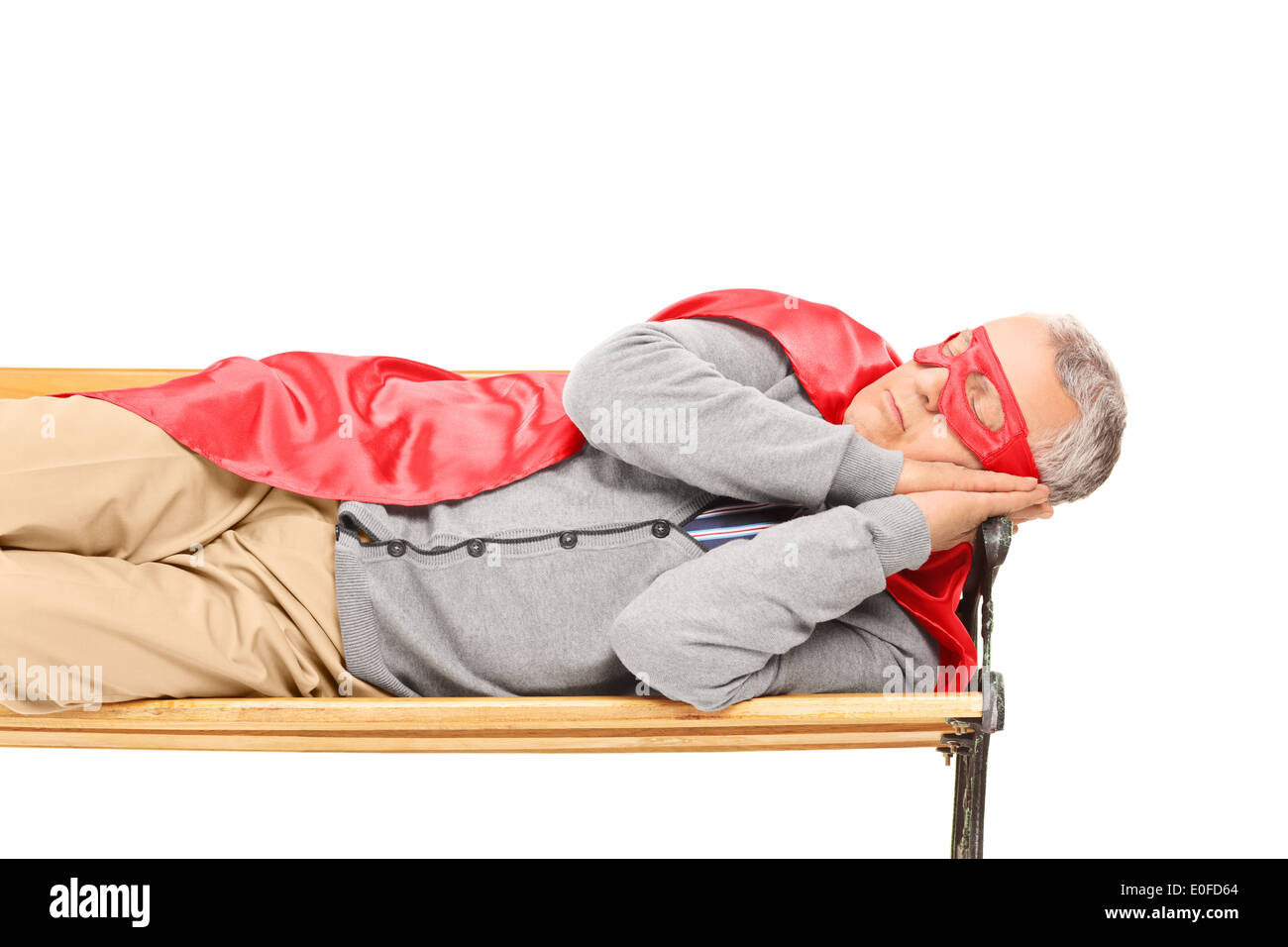 senior-man-in-superhero-costume-sleeping-on-bench-E0FD64.jpg