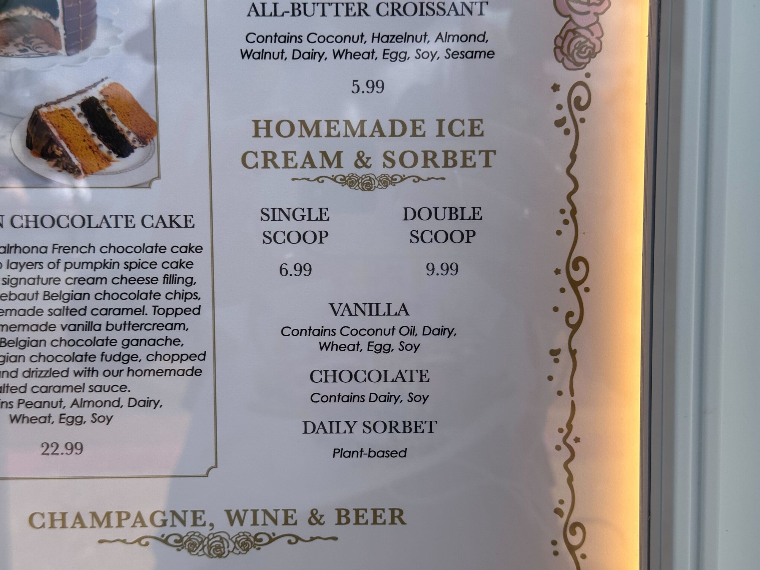 Discover our delightful cake bake shop menu featuring ice cream and sorbet options: single scoop ($6.99) or double scoop ($9.99). Indulge in flavors like vanilla, chocolate, and our daily sorbet creation. Ingredients and allergens provided for your convenience.