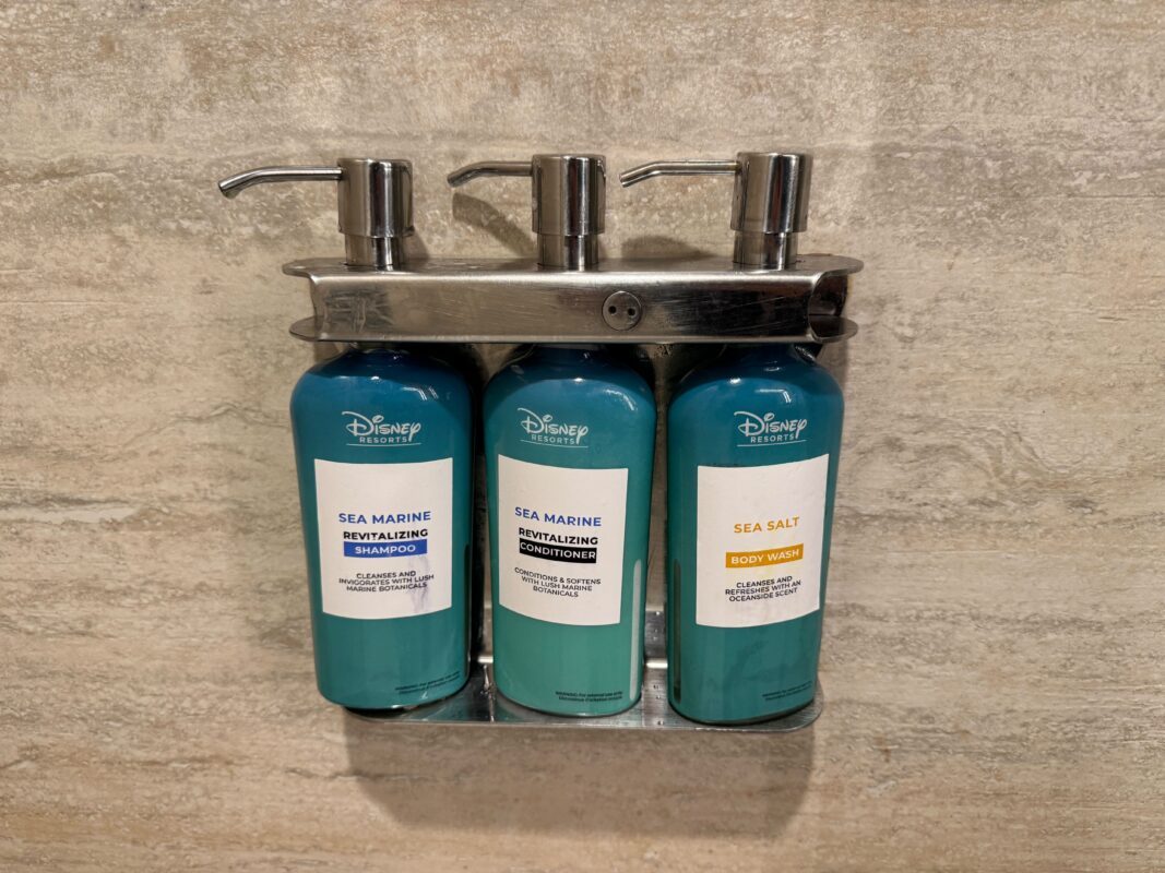The old look for the H2O+ shampoo, conditioner, and body wash in Walt Disney World hotel shower