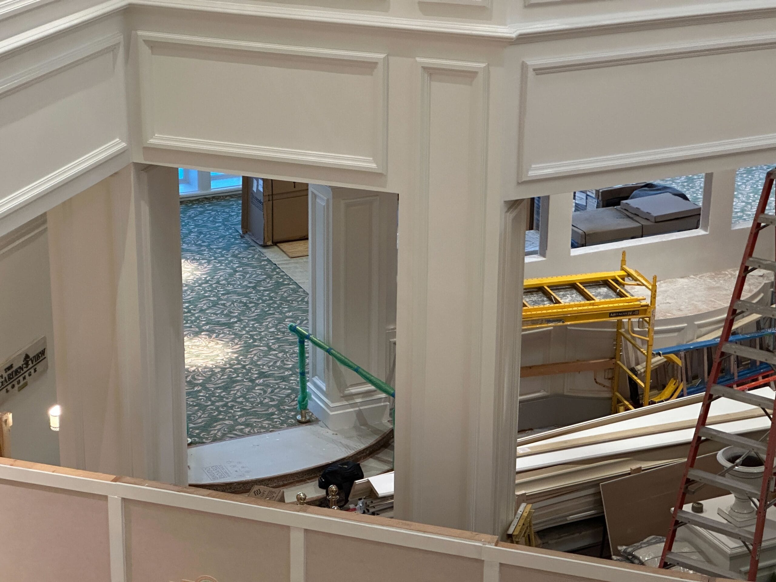 Hotel lobby at Disney Resort’s Grand Floridian under renovation with construction materials and unfinished walls visible.