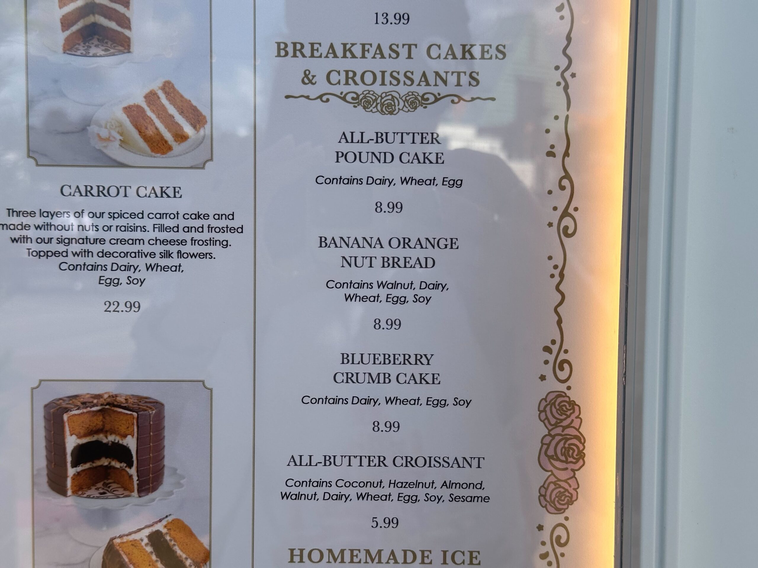 Discover our delightful cake bake shop menu featuring breakfast cakes and croissants, with all-butter pound cake, banana orange nut bread, and blueberry crumb cake. Beautiful images and detailed allergen information accompany each selection.
