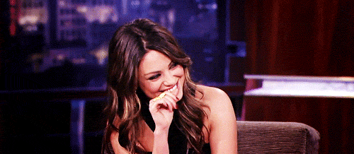 mila-kunis-cheeky-smile-gif.gif