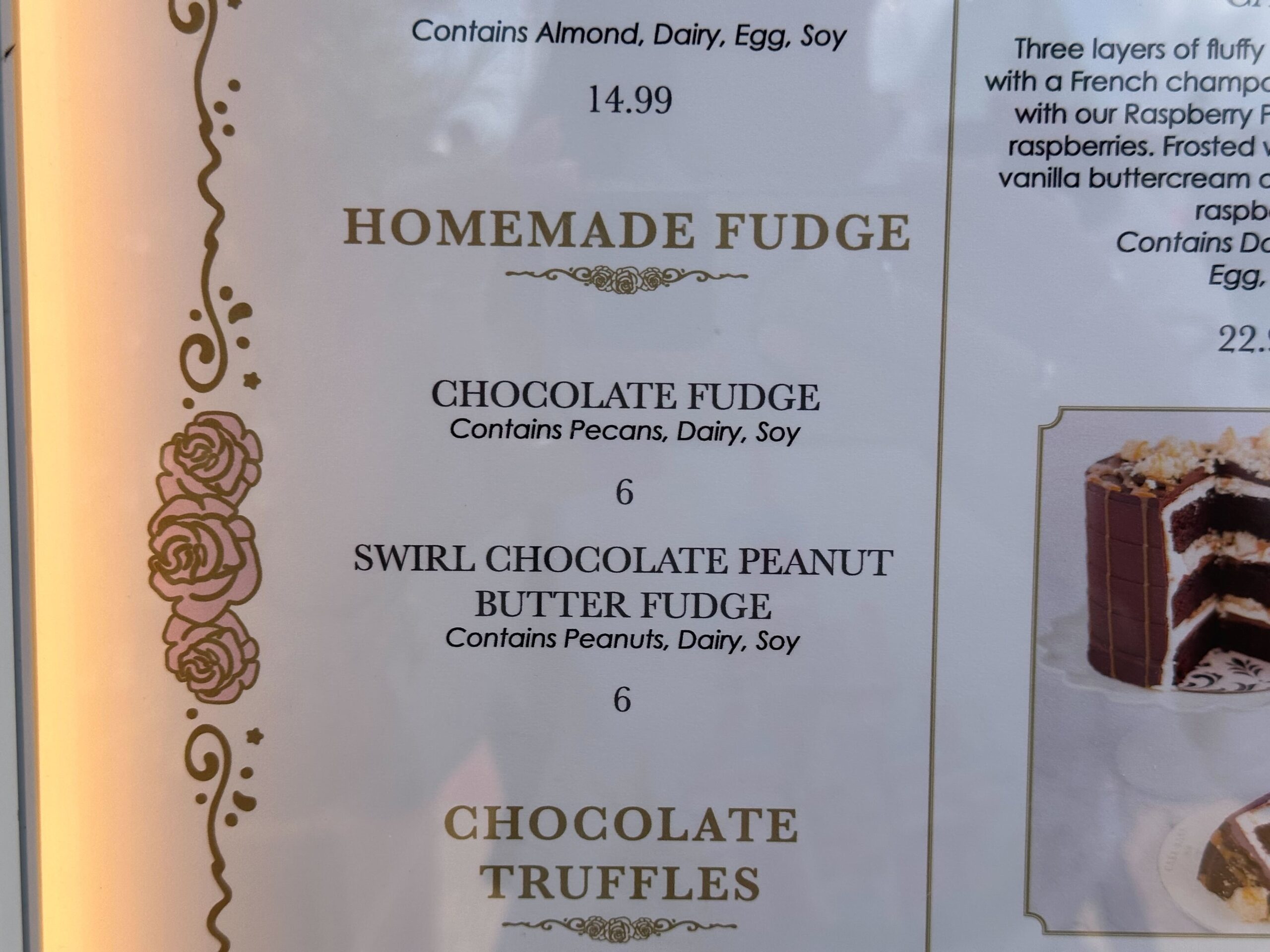 Indulge in our Cake Bake Shop delights: Homemade Chocolate Fudge with pecans, dairy, soy; and Swirl Chocolate Peanut Butter Fudge with peanuts, dairy, soy.