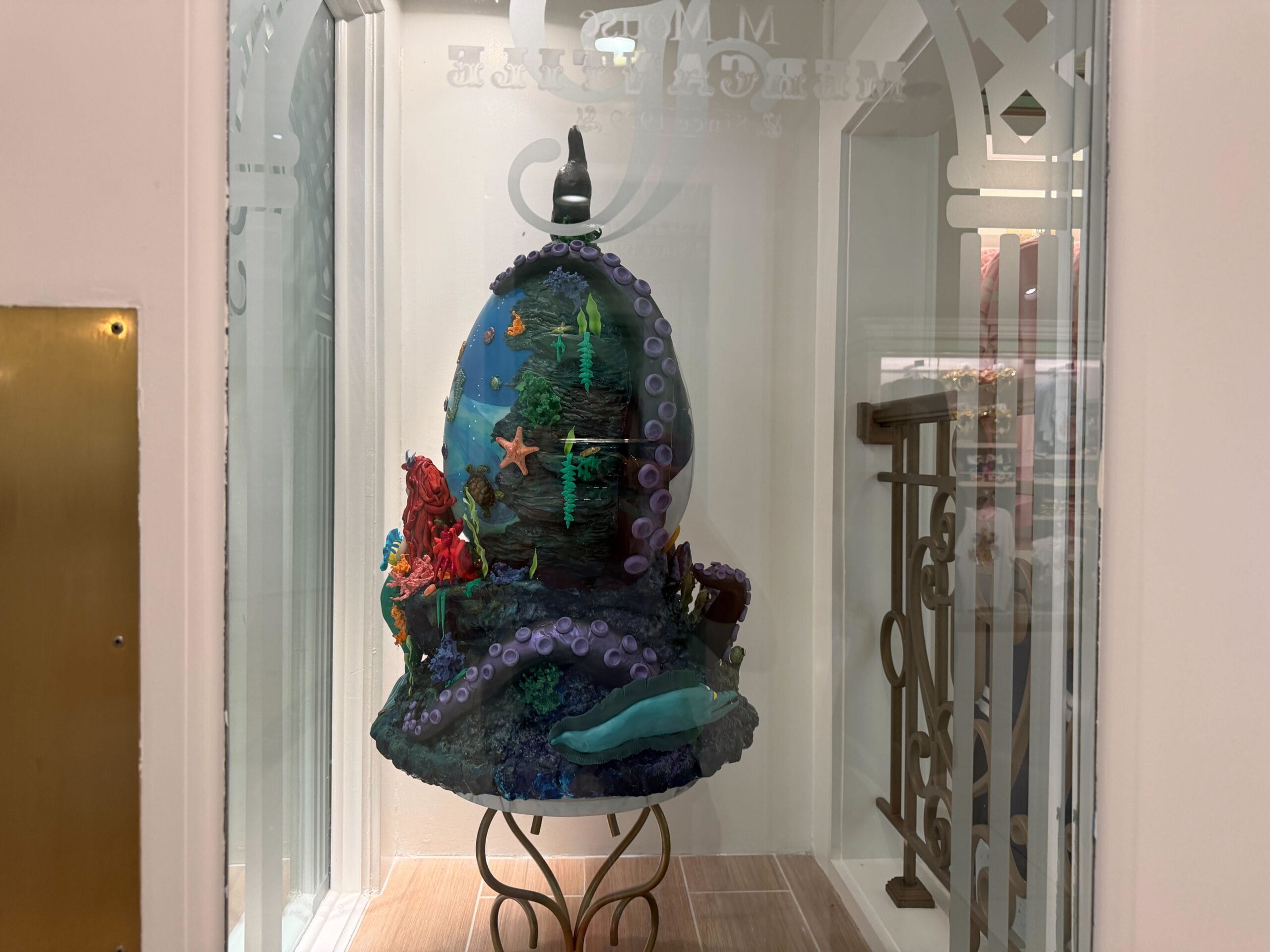 Chocolate Easter egg display themed to The Little Mermaid in the lobby of the Grand Floridian Resort at Walt Disney World