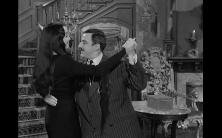 394468608-Morticia___Gomez_Dip.gif