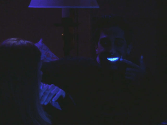 friends_608_ross_teeth_black_light.jpg