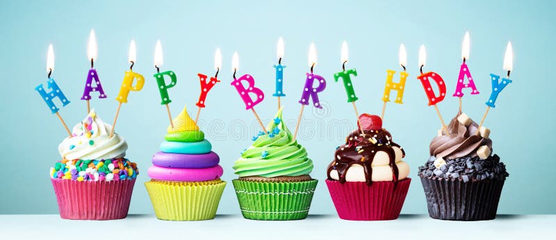 colorful-happy-birthday-cupcakes-candles-spelling-148323072.jpg