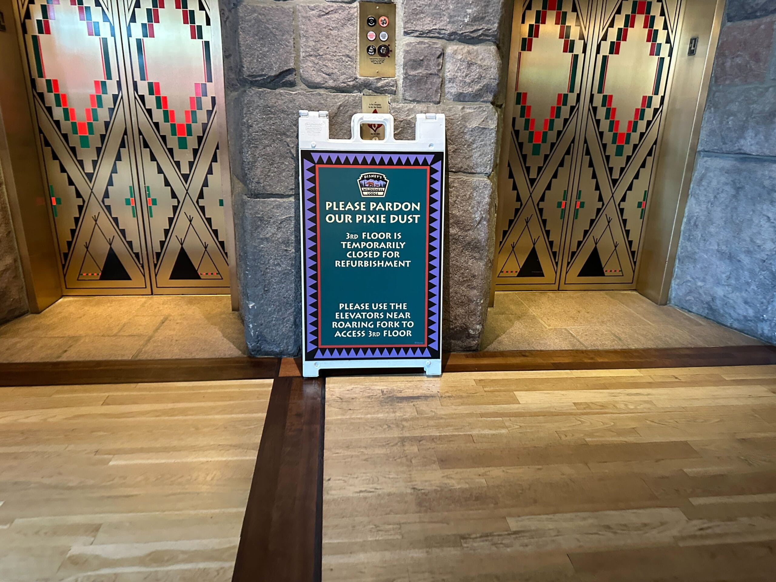 A sign in front of two elevators announces closure of the 3rd floor for refurbishment at Wilderness Lodge. 