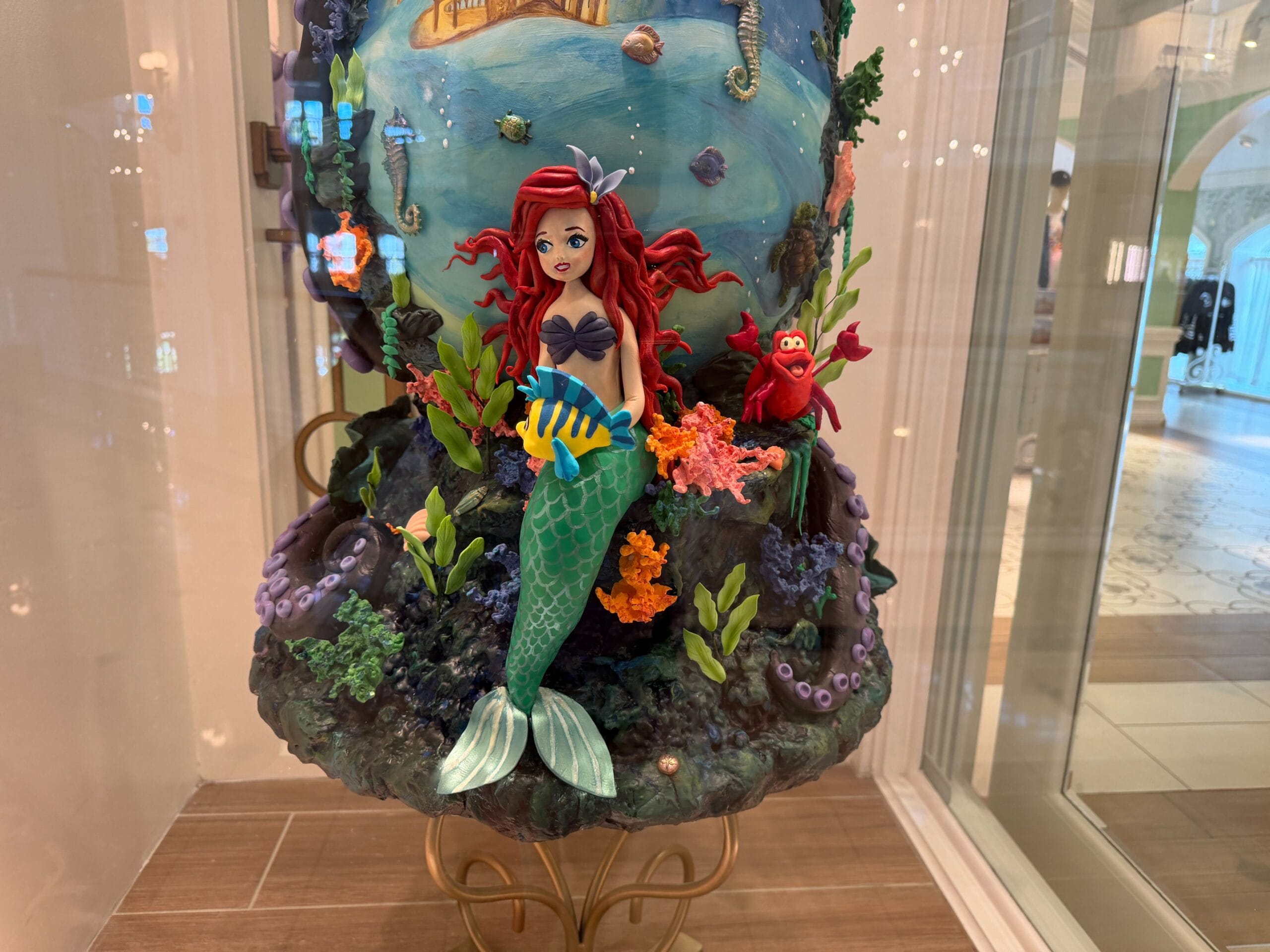 Chocolate Easter egg display themed to The Little Mermaid in the lobby of the Grand Floridian Resort at Walt Disney World